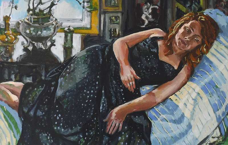 A large rectangular oil painting in landscape format, by Nina Packer; a red headed girl lies on a couch facing us, she is wearing a 1940s black halter-neck evening dress covered with shimmering polka dots, she has bare feet, one hand rests across her waist, the other down on her dress, her gaze is towards the bottom right of the picture. Behind her there is a window letting in Winter light that fall across a little highly polished table with plants and a dish of oranges, there are paintings on the walls behind her.